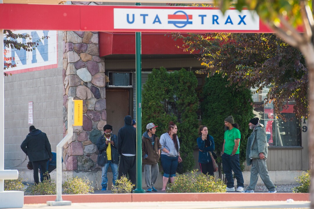 (Chris Detrick  |  The Salt Lake Tribune)  People outside of Gateway Inn 819 West North Temple in Salt Lake City Tuesday, October 17, 2017. 