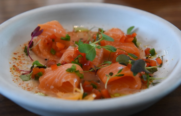(Francisco Kjolseth  |  The Salt Lake Tribune)  New Zealand Salmon Tiradito at the Post Office Place, a new bar by the same owners as Takashi, located next door, welcomes patrons on Tuesday, June 19, 2018. One of the main reasons Takashi and Tamara Gibo opened this downtown watering hole is so that their patrons could have a drink while waiting for a seat at Takashi where the wait can sometimes be an hour long and liquor laws don't allow cocktails unless you are seated.