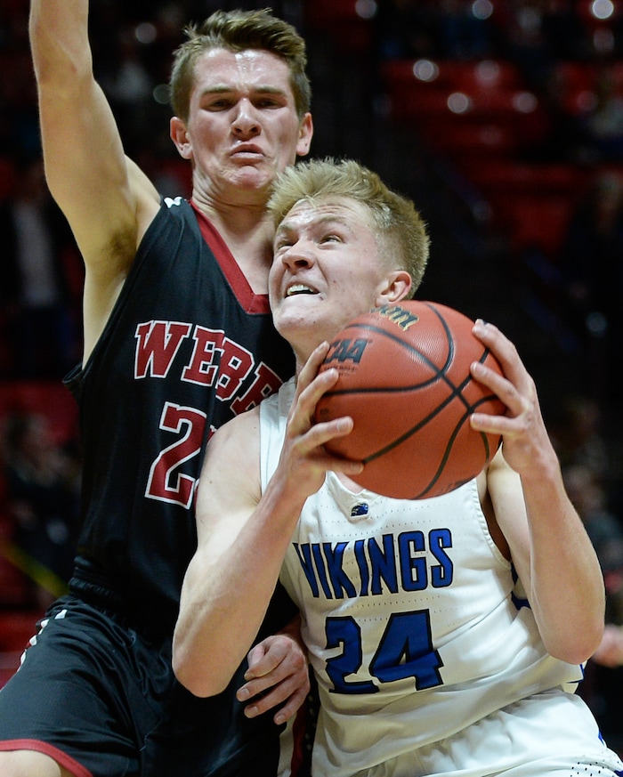 (Francisco Kjolseth  |  The Salt Lake Tribune)  Weber vs Pleasant Grove, 6A State high school basketball tournament at the Huntsman Center in Salt Lake City, Thursday March 1, 2018. Weber's Brandon Carpenter (22) pressures Pleasant Grove's Kael Mikkelsen (24). 