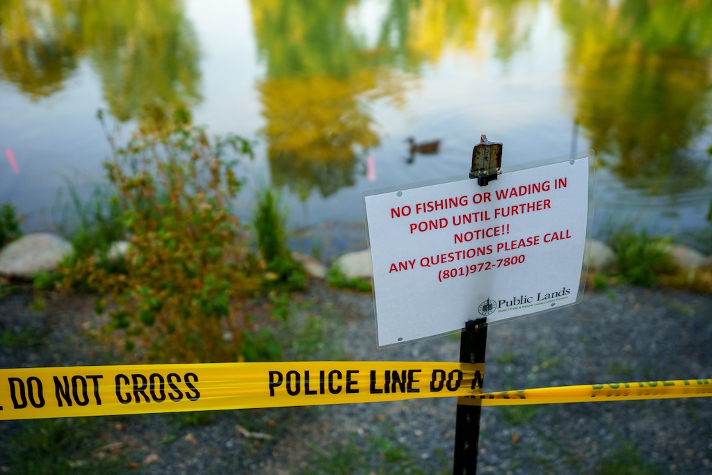 (Trent Nelson  |  The Salt Lake Tribune) Yellow tape surrounds the Fairmont Park Pond in Salt Lake City on Thursday, Sept. 9, 2021. Testing has revealed the potential presence of mercury.