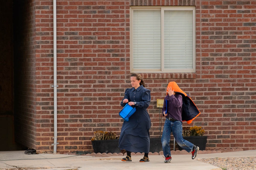(Trent Nelson | The Salt Lake Tribune)  A young woman and boy at a Cedar City home where members of the polygamous Fundamentalist Church of Jesus Christ of Latter-Day Saints are purported to live, Wednesday November 8, 2017.