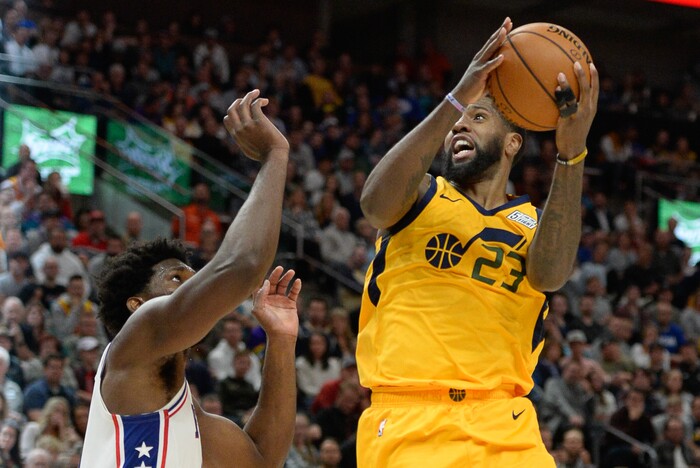 (Francisco Kjolseth  |  The Salt Lake Tribune)  Utah Jazz forward Royce O'Neale (23) goes up against Philadelphia 76ers center Joel Embiid (21) as the Utah Jazz host the Philadelphia 76ers in their NBA basketball game at Vivint Smart Home Arena in Salt Lake City on Wednesday, Nov. 6, 2019.