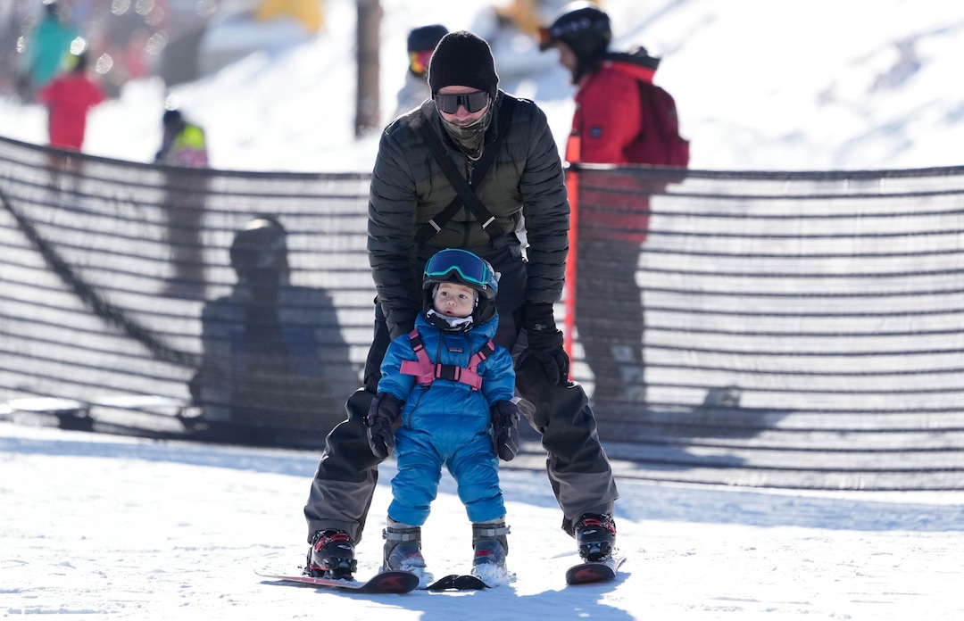 (Francisco Kjolseth | The Salt Lake Tribune) Al Lanning teaches his son Wyatt, 2, the basics during his second season on snow as they have some fun at Park City Mountain Resort on Saturday, Dec. 18, 2021.