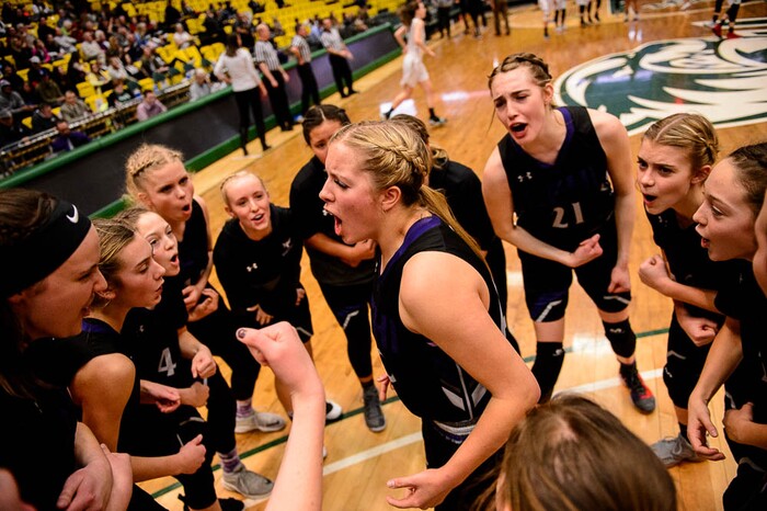 (Trent Nelson | The Salt Lake Tribune)
Lehi vs. Desert Hills, 4A State high school basketball tournament at Utah Valley University in Orem, Thursday March 1, 2018. Lehi's Savannah Heaton (40) leads the pre-game huddle.