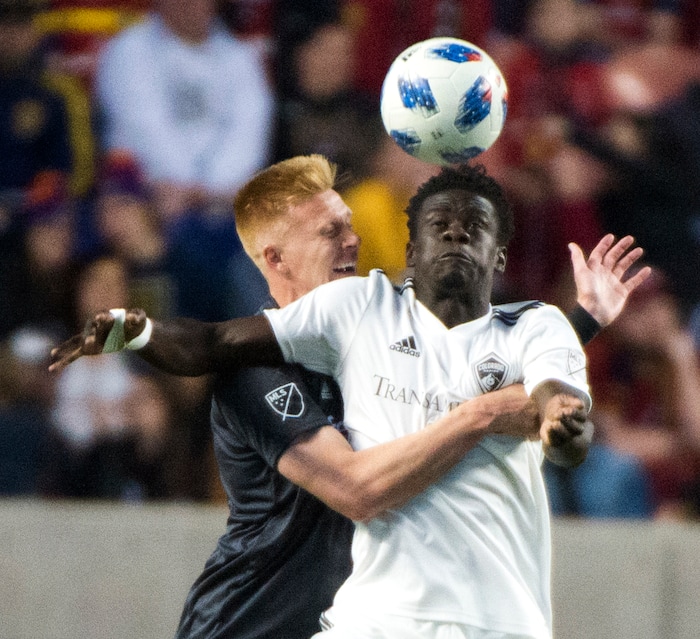 (Rick Egan  |  The Salt Lake Tribune) Real Salt Lake defender Justen Glad (15) goes for the ball along with Colorado Rapids forward Dominique Badji (14), in MLS soccer action, between Real Salt Lake and Colorado Rapids,  at Rio Tinto Stadium, Saturday, April 21, 2018.


