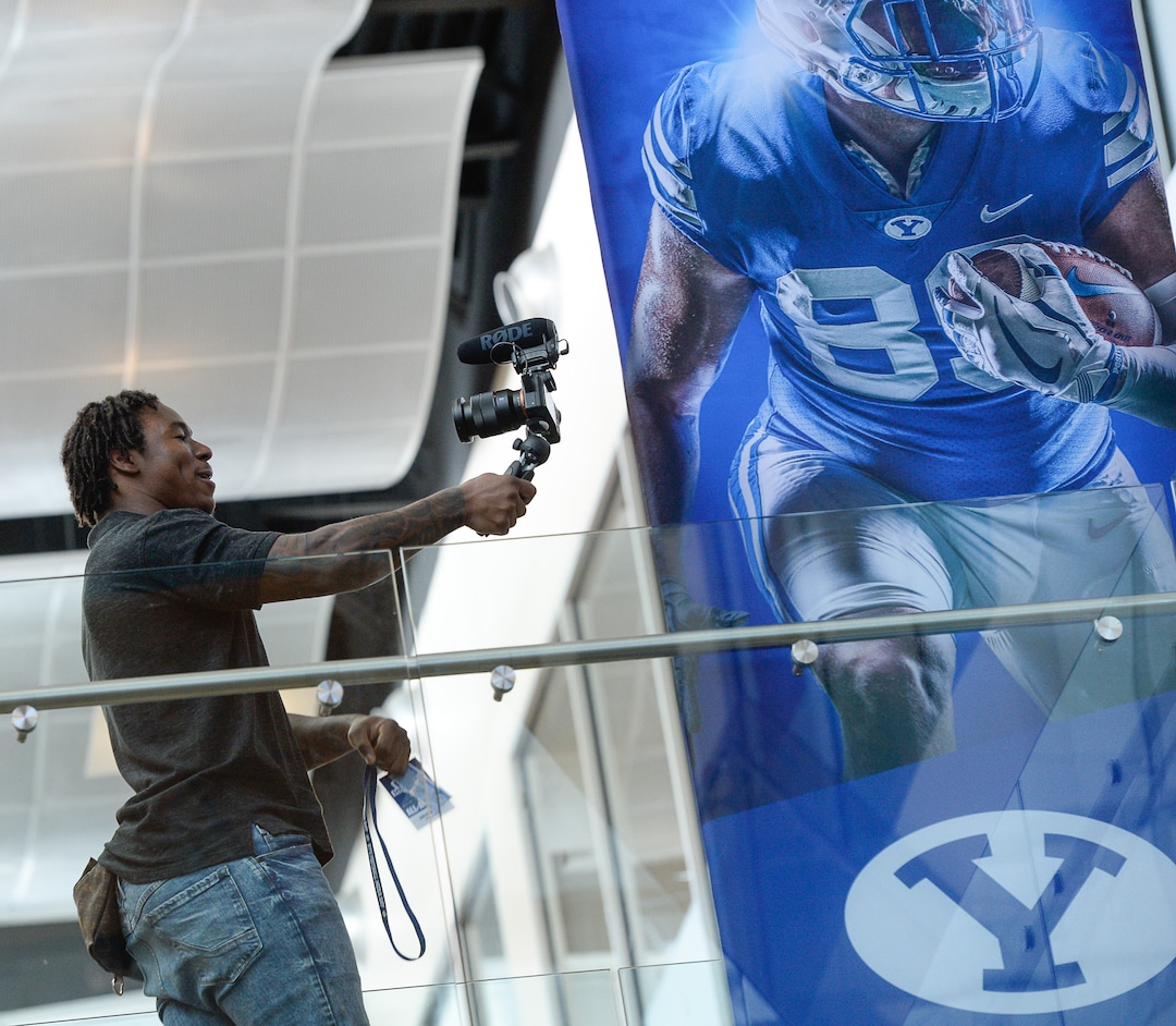 (Francisco Kjolseth  |  The Salt Lake Tribune)  Former BYU football player Jamaal Williams, now with the Green Bay Packers works the selfie camera during media day at the BYU-Broadcasting Building on Friday, June 22, 2018.