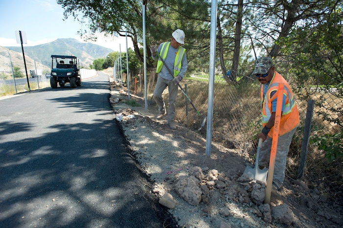 (Rick Egan | The Salt Lake Tribune) Fencing goes up along Parley's Trail on Wednesday, Aug. 30, 2017.