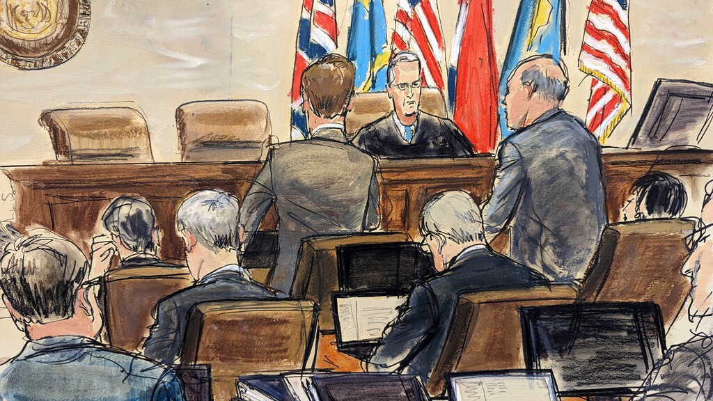 (Elizabeth Williams via AP) This artist sketch depicts Dominion Voting Systems attorney Justin Nelson, standing left, and Fox News attorney Daniel Webb, standing at right, speaking to Judge Eric Davis before finishing jury selection in Delaware Superior Court Tuesday, April 18, 2023, in Wilmington, Del.