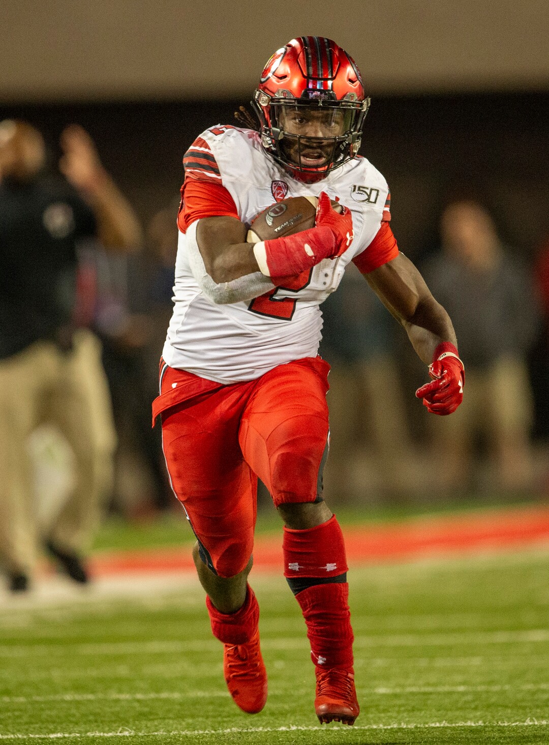 (Rick Egan  |  The Salt Lake Tribune)      Utah running back Zack Moss (2) runs the ball for the Utes, in PAC-12 action between the Utah Utes and the Arizona Wildcats in Tucson, Saturday, Nov. 23, 2019.