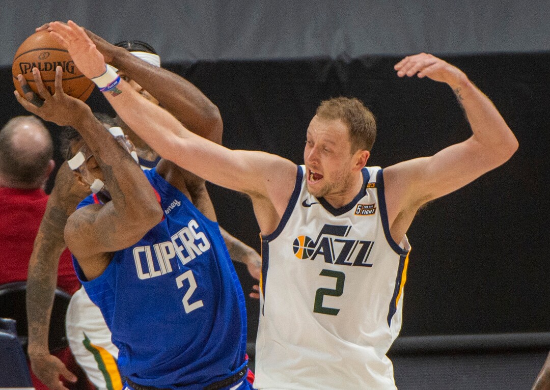 (Rick Egan | The Salt Lake Tribune) LA Clippers forward Kawhi Leonard (2) makes a move as Utah Jazz forward Joe Ingles (2) defends, in NBA action between the Utah Jazz and the LA Clippers at Vivint Arena, on Friday, Jan. 1, 2021.