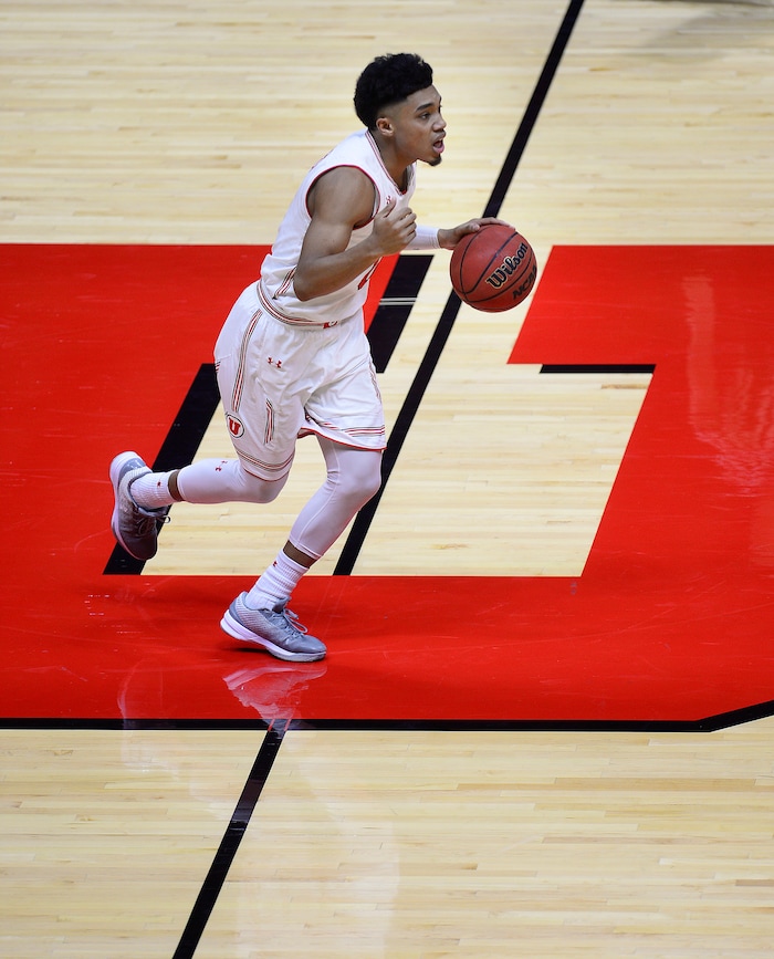 (Scott Sommerdorf   |  The Salt Lake Tribune)   Utah's Sedrick Barefield advances the ball over the U during second half play. Utah defeated Eastern Washington 85-69, Friday, November 24, 2017. 