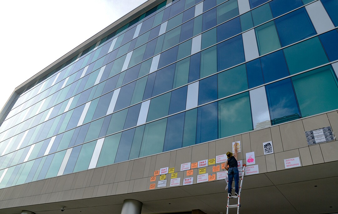 (Francisco Kjolseth  |  The Salt Lake Tribune) A group of about twenty people again showed up at the Salt Lake County District AttorneyÕs Office on Sunday, June 21, 2020, as part of their vow to come out every day until officials release the investigation into Bernardo Palacios-CarbajalÕs death by police. They hung protest signs on the building's windows.