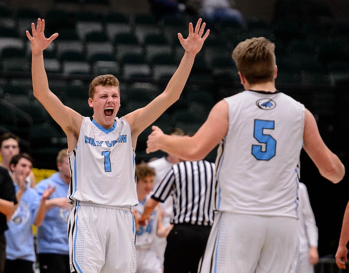 (Trent Nelson | The Salt Lake Tribune)  Payson vs. Sky View, 4A State high school basketball tournament at Utah Valley University in Orem, Thursday March 1, 2018. Sky View's Mason Falslev (1) celebrates a large second half lead.