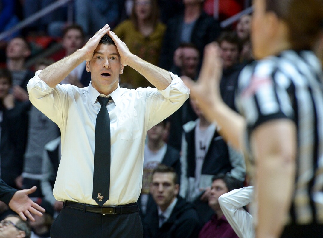 (Leah Hogsten  |  The Salt Lake Tribune) Lone Peak's head coach David Evans questions a charging call. Lone Peak defeated Pleasant Grove 61-44 to win the 6A High School Boys’ Basketball Tournament Championship at the Jon M. Huntsman Center in Salt Lake City, Saturday, March 3, 2018. 