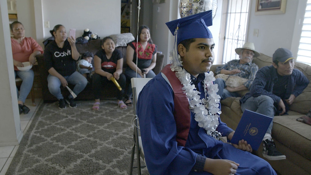 (Sean Havey | courtesy of Sundance Institute) Denilson Garibo graduates with his 2020 class at Oakland High School, in a ceremony held remotely because of COVID-19, in a scene from "Homeroom," by Peter Nicks. It's an official selection of the U.S. Documentary Competition at the 2021 Sundance Film Festival.