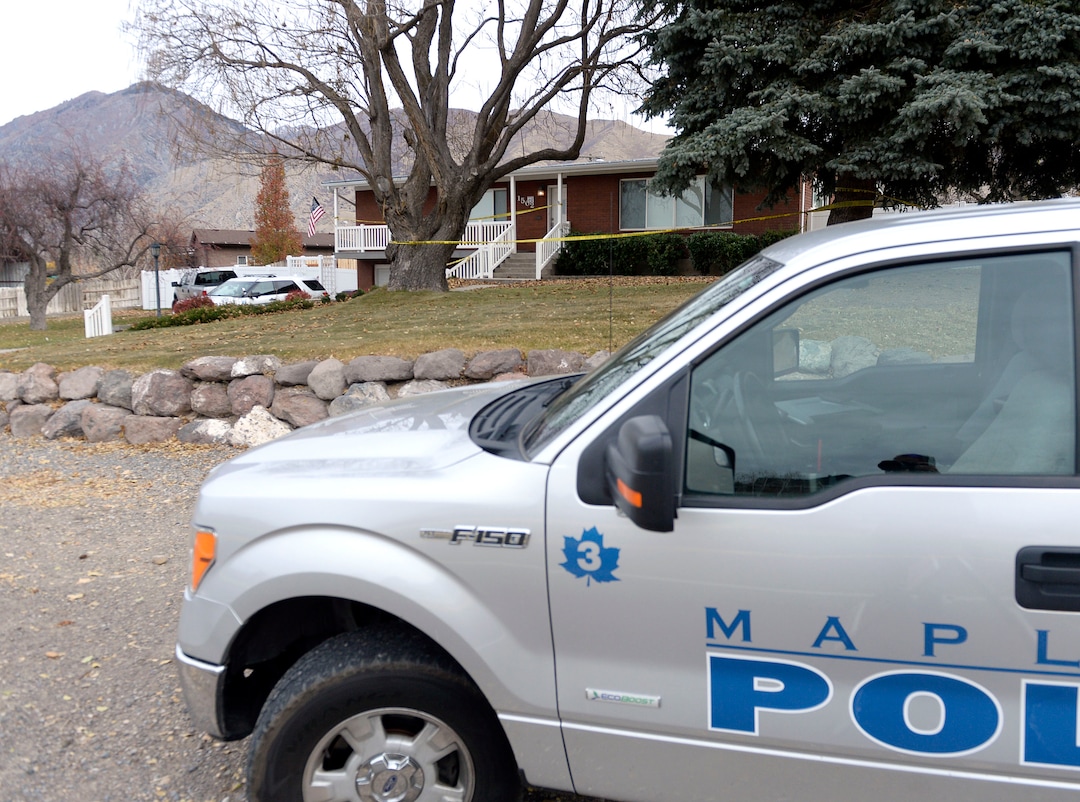(Al Hartmann  |  The Salt Lake Tribune) 	Home at 1502 N. SR 89 in Mapleton is blocked off by police tape where a  family of four was found shot to death.  Police are investigating it as a suspected case of murder-suicide.