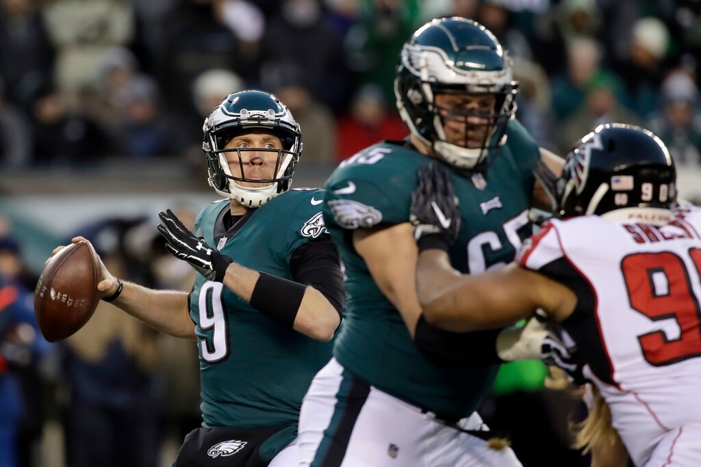 (AP Photo/Matt Rourke) Philadelphia Eagles' Nick Foles in action during the first half of an NFL divisional playoff football game against the Atlanta Falcons, Saturday, Jan. 13, 2018, in Philadelphia.