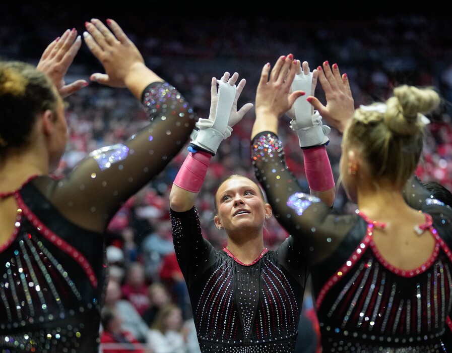(Francisco Kjolseth | The Salt Lake Tribune) Utah’s Avery Neff celebrates her bars routine as the Utah Red Rocks compete against Minnesota and Iowa at the Jon M. Huntsman Center on Friday, Jan. 2, 2026.