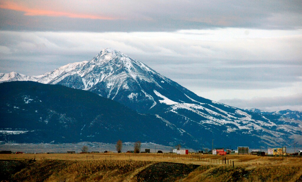 (Matthew Brown | The Associated Press) This Nov. 21, 2016, file photo shows Emigrant Peak towering over the Paradise Valley in Montana north of Yellowstone National Park, the day U.S. officials announced a ban on new mining claims across more than 30,000 acres in the area. U.S. government officials are moving forward with a plan to block new gold mining claims for 20 years on more than 30,000 acres of public lands north of Yellowstone National Park. The U.S. Forest Service released a draft environmental assessment on Thursday, March 29, 2018, for the proposed withdrawal of lands in the Absaroka mountains from new claims for gold and other "locatable" minerals, such as silver, platinum and uranium.