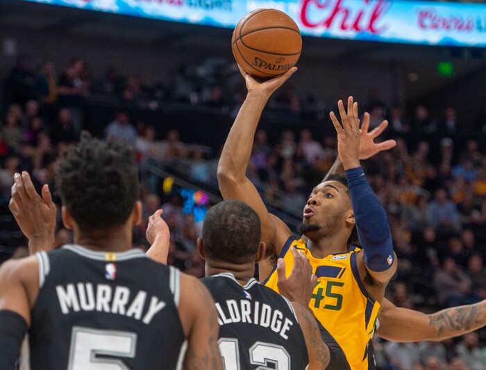 (Rick Egan  |  The Salt Lake Tribune)    
Utah guard Donovan Mitchell (45) shoots for the Jazz, in NBA action between the Utah Jazz and the San Antonio Spurs, in Salt Lake City, Friday, Feb. 21, 2020.