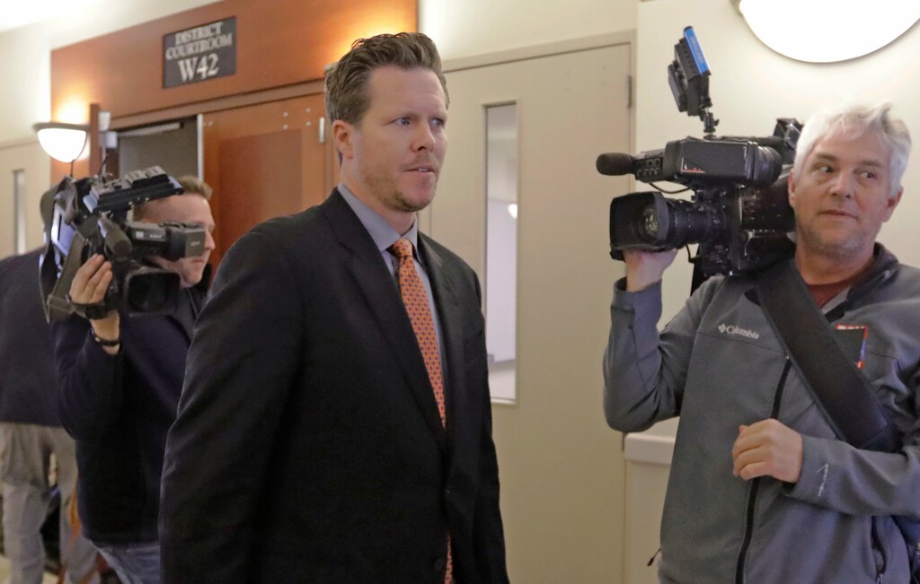 (Rick Bowmer | AP file photo) Paul Petersen, an Arizona elected official accused of running a multi-state adoption scheme, leaves court following an initial appearance on charges filed in the state Friday, Nov. 15, 2019, in Salt Lake City. Prosecutors in three states say Petersen brought pregnant women from the Marshall Islands to the United States and paid them to give up their babies for adoption. He's pleaded not guilty.