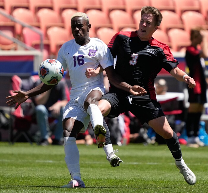 (Francisco Kjolseth | The Salt Lake Tribune) Lehi’s Yonelson Aitken (16) takes on Alta’s Caleb Lowry (3) during their 5A State Soccer Championship title at Rio Tinto Stadium, Wednesday, May 25, 2022. Alta defeated Lehi in shootout 3-1.