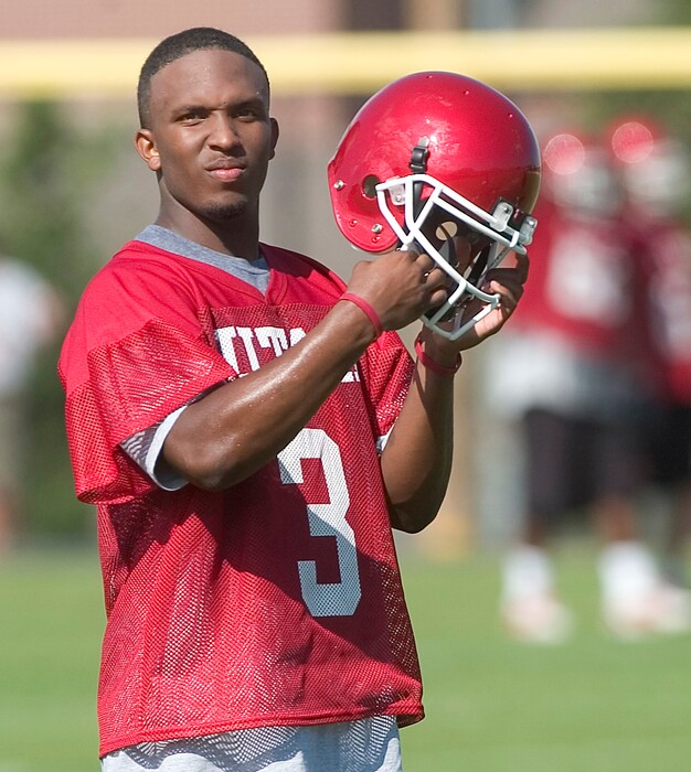 (Al Hartmann | Tribune file photo) Ute quarterback Brian Johnson in fall football camp, 2005.