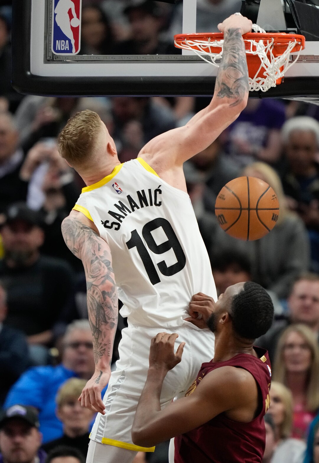 (Francisco Kjolseth  |  The Salt Lake Tribune) Utah Jazz forward Luka Samanic (19) makes a dunk as the Utah Jazz host the Cleveland Cavaliers at the Delta Center in Salt Lake City on Tuesday, April 2, 2024.