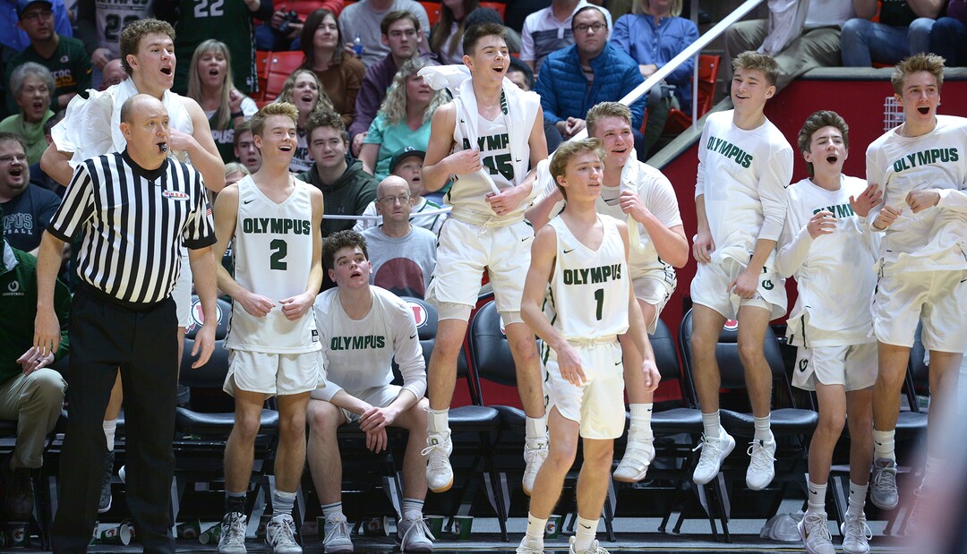 (Leah Hogsten  |  The Salt Lake Tribune) Olympus starters cheer on the second unit after leaving the game. Olympus defeated Corner Canyon 76-49 to win the 5A High School BoysÕ Basketball Tournament Championship at the Jon M. Huntsman Center in Salt Lake City,  Saturday, March 3, 2018. 