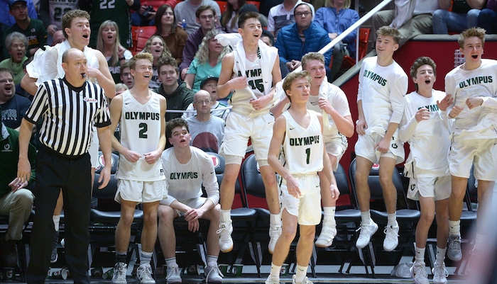 (Leah Hogsten | The Salt Lake Tribune) Olympus starters cheer on the second unit after leaving the game. Olympus defeated Corner Canyon 76-49 to win the 5A High School BoysÕ Basketball Tournament Championship at the Jon M. Huntsman Center in Salt Lake City, Saturday, March 3, 2018.