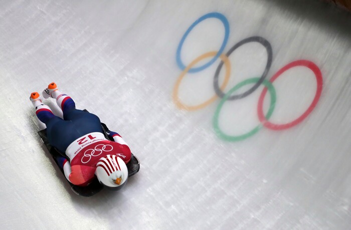 Katie Uhlaender of United States takes a curve on her second run during the women's skeleton competition at the 2018 Winter Olympics in Pyeongchang, South Korea, Friday, Feb. 16, 2018. (AP Photo/Michael Sohn)