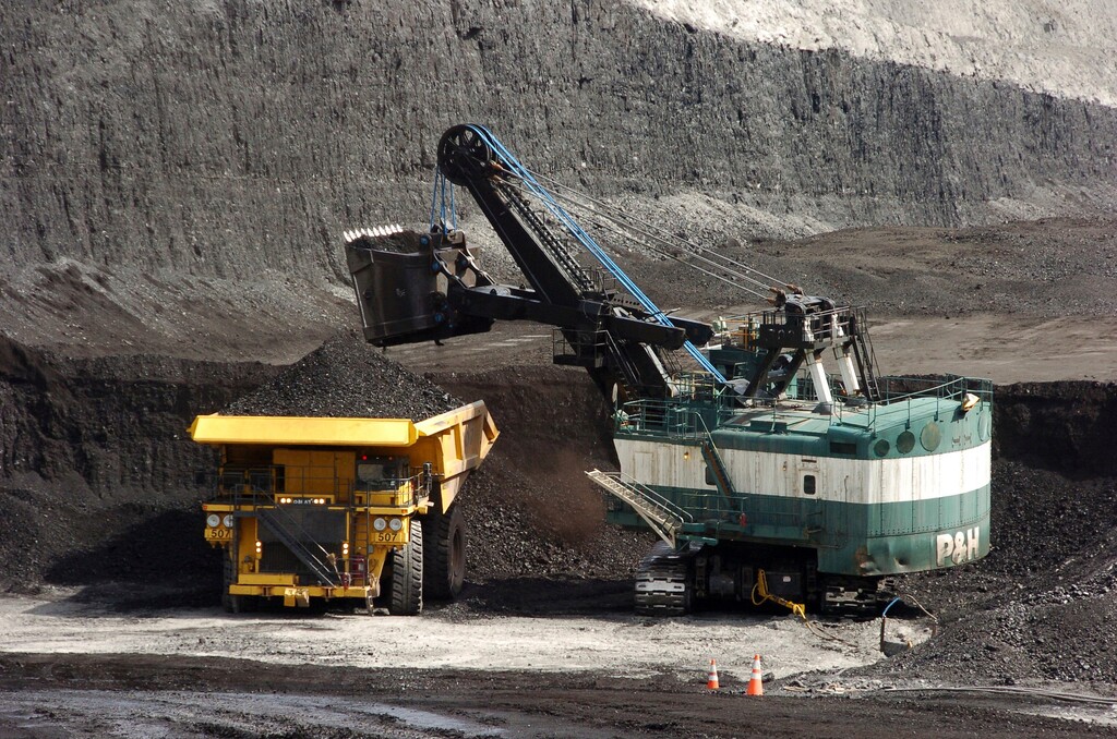 (Matthew Brown | AP file photo) A mechanized shovel loads a haul truck that can carry up to 250 tons of coal at the Spring Creek coal mine near Decker, Mont., April 4, 2013. The Trump administration says the resumption of coal sales from public lands will result in a negligible increase in greenhouse gas emissions, but critics say that ignores the federal coal programs broader impacts.