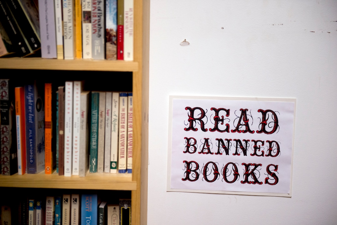 (Jeremy Harmon  |  The Salt Lake Tribune) A "read banned books" sign on the wall at Ken Sanders Rare Books in Salt Lake City on January 16, 2020.