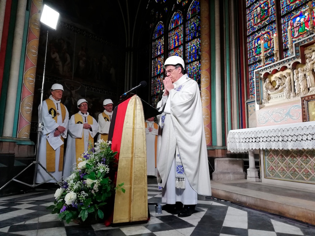(Karine Perret, Pool via AP) The Archbishop of Paris Michel Aupetit leads the first Mass in a side chapel, two months after a devastating fire engulfed Notre Dame in Paris, Saturday June 15, 2019.