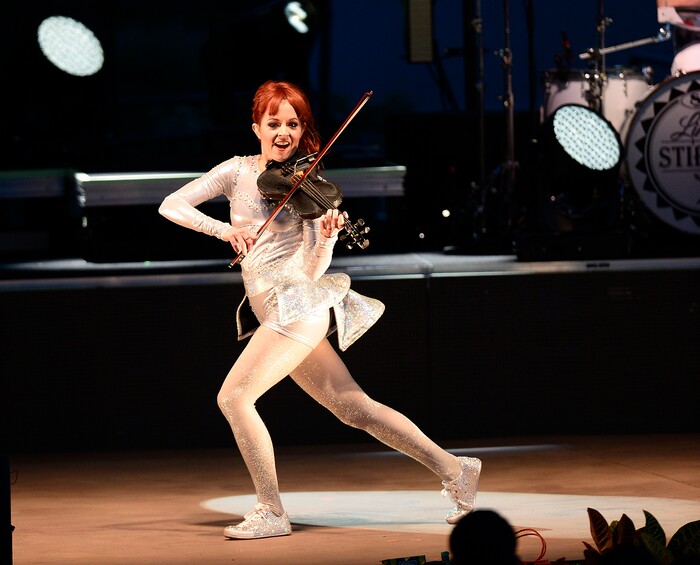 (Scott Sommerdorf | The Salt Lake Tribune) Lindsey Stirling performs before a sold-out crowd at Red Butte Garden in Salt Lake City on Friday, May 29, 2015.