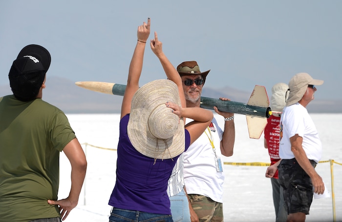 (Scott Sommerdorf   |  The Salt Lake Tribune)   Spectators watch rockets launch on the Bonneville Salt Flats during "HellFire" — the event sponsored by the Utah Rocket Club on Saturday, Aug. 5, 2017.