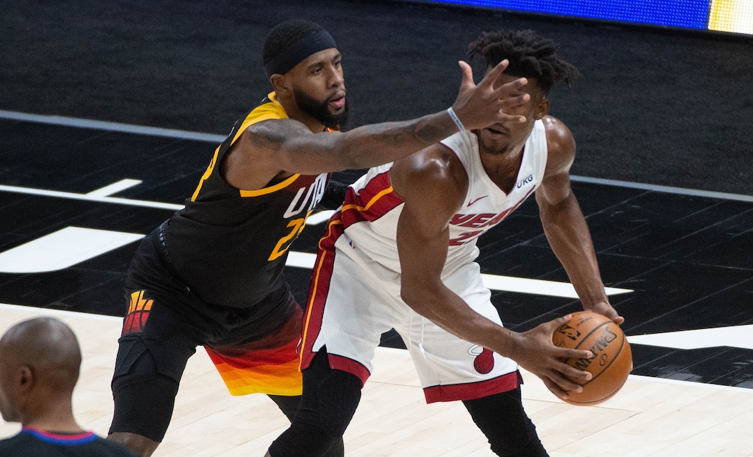(Francisco Kjolseth  | The Salt Lake Tribune) Utah Jazz forward Royce O'Neale (23) pressures Miami Heat forward Jimmy Butler (22) as the Utah Jazz take on the Miami Heat at Vivint Smart Home Arena in Salt Lake City, on Saturday, Feb. 13, 2021.