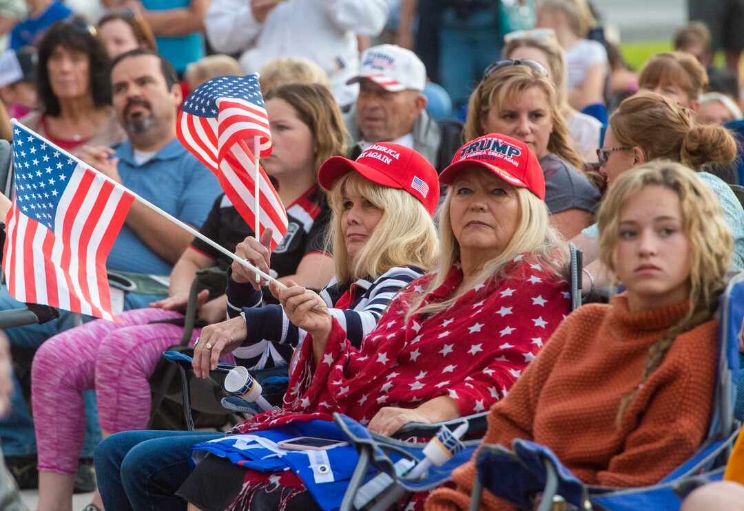 (Rick Egan  |  The Salt Lake Tribune)     Several people carried guns, but no one was wearing masks, as a couple of hundred people gather at the Provo Courthouse for the Utah County Freedom Rally on Friday, Oct. 2, 2020.