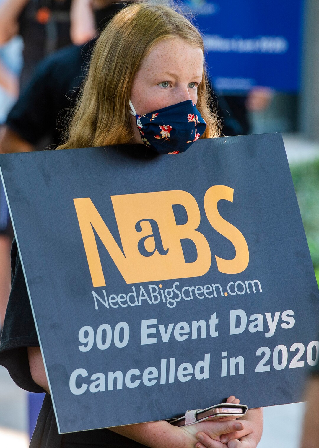 (Rick Egan  |  The Salt Lake Tribune)     Grace O’Doherty joins more than 100 members of Utah Live Events Industry Association before a march to the State Capitol to call attention to the state of their industry, on Tuesday, July 21, 2020.