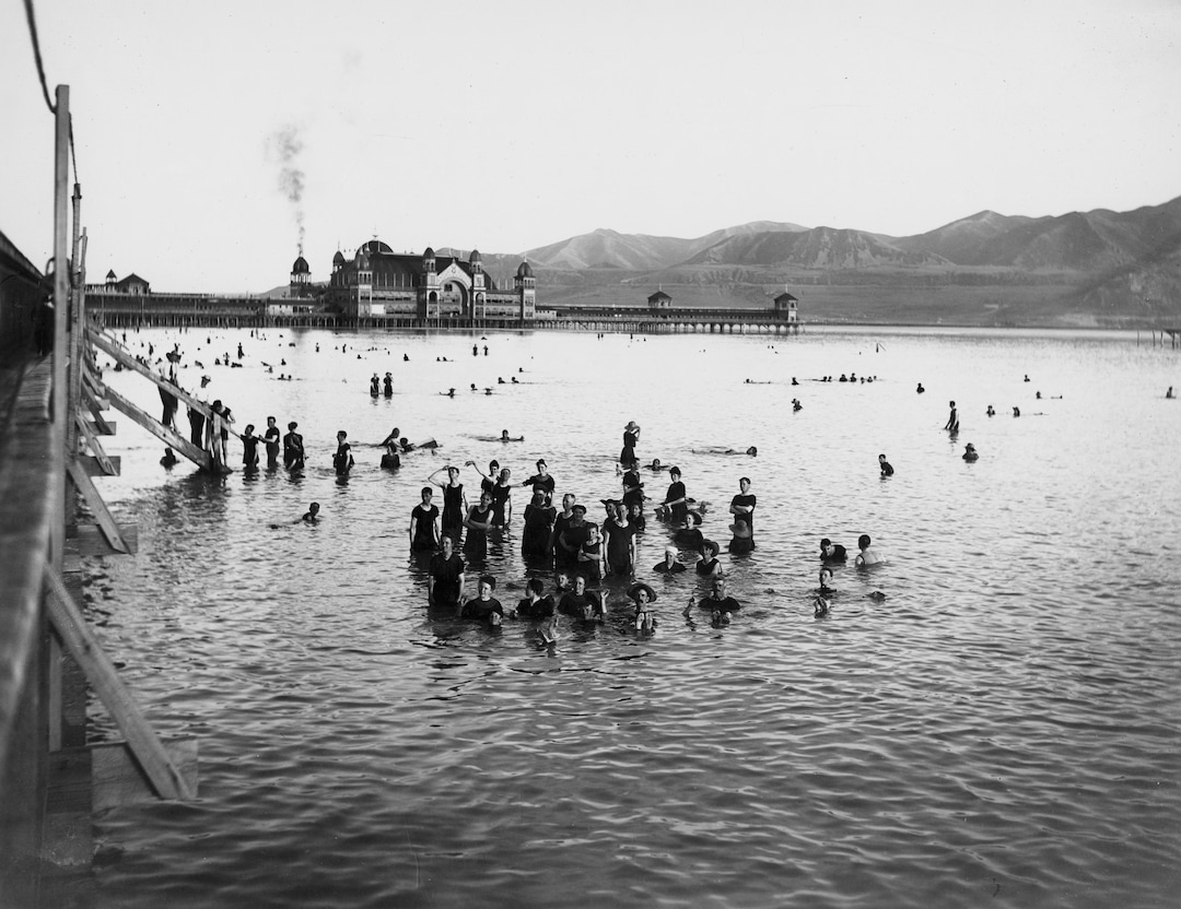 (Utah State Historical Society) Bathers at Saltair, July 24, 1906.  "A short train ride from downtown Salt Lake City, Saltair offered respite during the hot summer months and provided workers with an affordable source of entertainment in their leisure time. Fifty cents bought visitors a round trip train ticket and admission to the resort," according to the Utah Division of State History.
