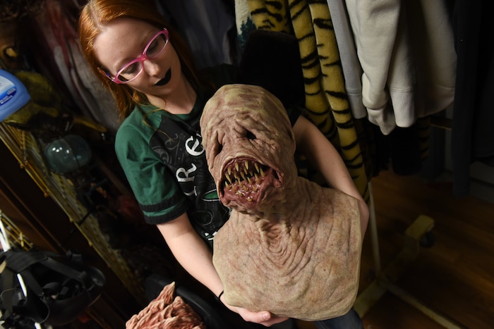 (Francisco Kjolseth  |  The Salt Lake Tribune)  Costumer Missy Moody pulls out some of her favorite costumes used at the Fear Factory in Salt Lake. Local politicians fell prey to the zombie apocalypse at the Fear Factory on Thursday, Oct. 12, 2017, for a special event to raise awareness of the Utah Food Bank and kick start donations. 