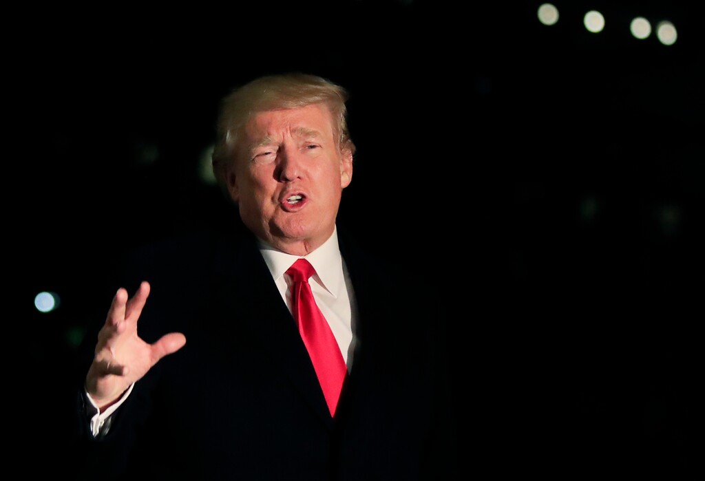 (Manuel Balce Ceneta | The Associated Press) President Donald Trump speaks to reporters upon arrival at the White House in Washington, Friday, Jan. 26, 2018, from the World Economic Forum in Davos, Switzerland. On Wednesday, as Republicans were clamoring to make public a secret document they think will undercut the investigation into Russian meddling, President Donald Trump made clear his desire: Release the memo.