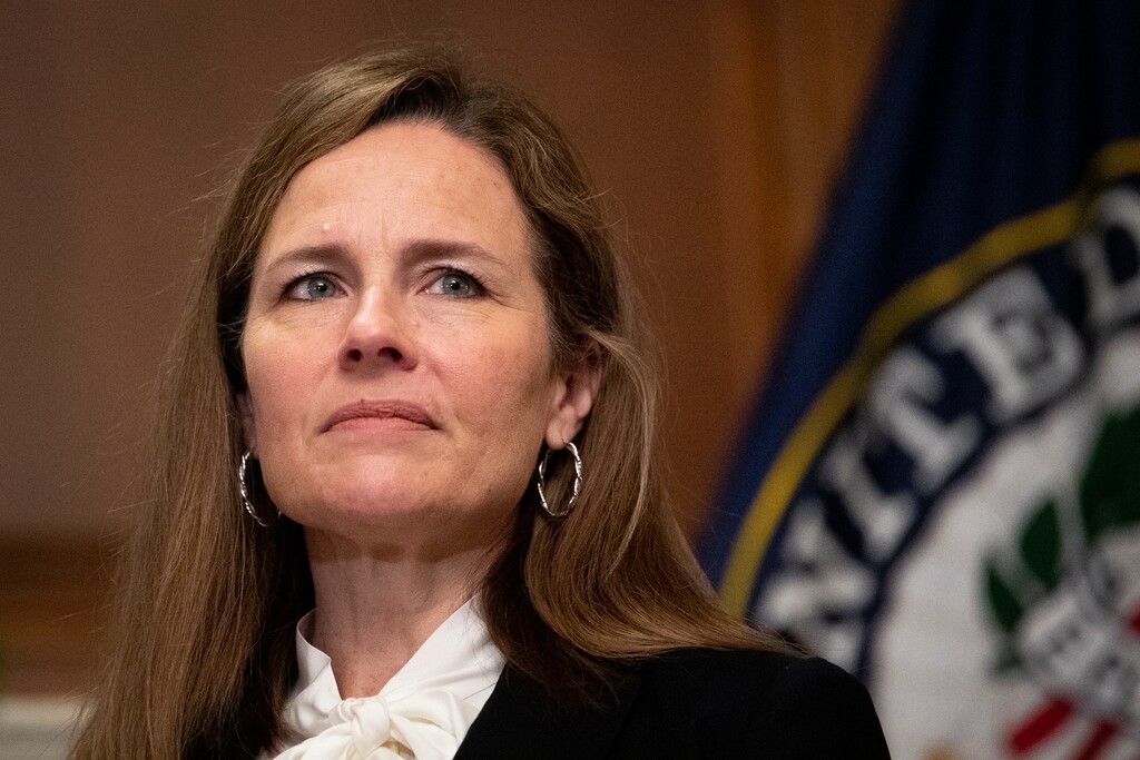 Supreme Court nominee Judge Amy Coney Barrett, meets with Sen. Joni Ernst, R-Iowa, not shown, Thursday, Oct. 1, 2020, at the Capitol in Washington.   (Caroline Brehman/Pool via AP)