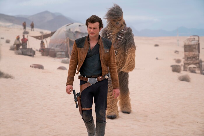 In this image released by Lucasfilm, Alden Ehrenreich and Joonas Suotamo appear in a scene from "Solo: A Star Wars Story," in theaters on May 25. (Jonathan Olley/Lucasfilm via AP)