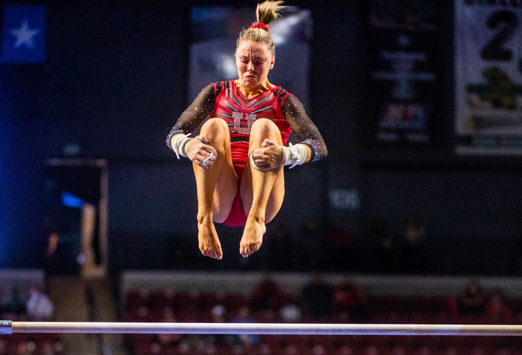 (Rick Egan | The Salt Lake Tribune) Maile O'Keefe competes on the uneven bars for Utah in the Best of Utah gymnastics meet at the Maverik Center on Saturday, Jan. 9, 2021.