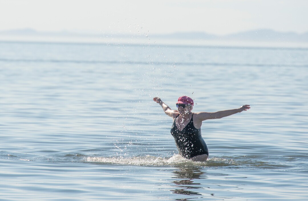 (Rick Egan  |  The Salt Lake Tribune)   Johanna Kowalewska from Warsaw, Poland  enjoys the warm fall weather as she splashes in the Great Salt Lake, Wednesday, Sept. 18, 2019.