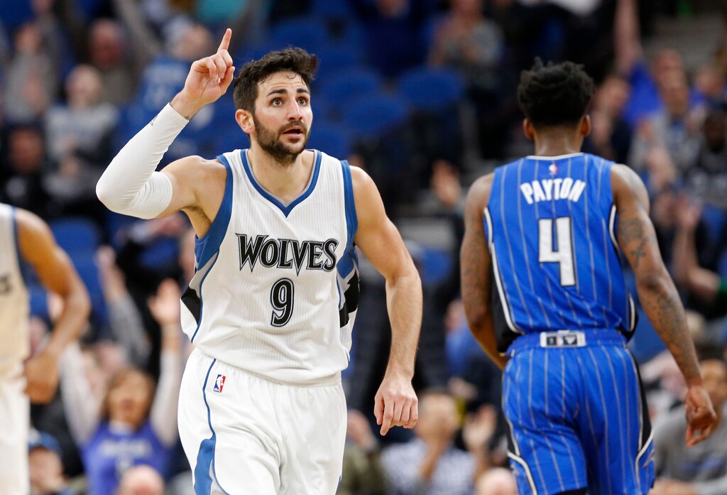 Minnesota Timberwolves' Ricky Rubio, of Spain, celebrates one of his three-point shots during the second half of an NBA basketball game against the Orlando Magic, Monday, Jan. 30, 2017, in Minneapolis. The Timberwolves won 111-105 in overtime. Rubio had six three-pointers and scored 22 points. (AP Photo/Jim Mone)