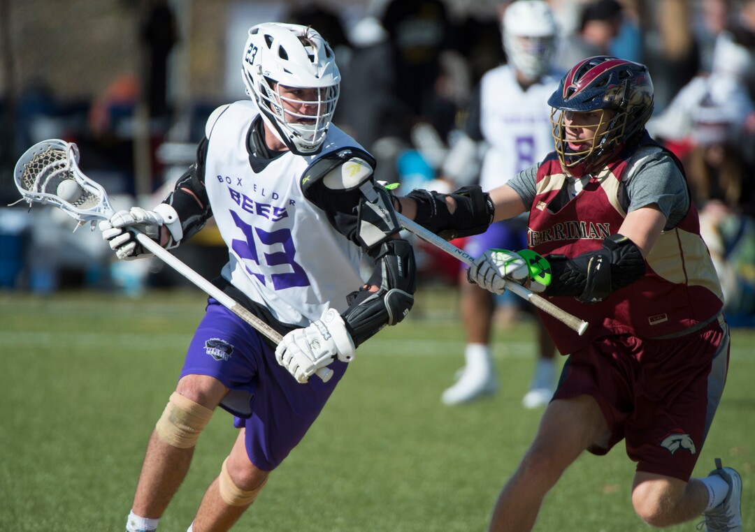 (Rick Egan | The Salt Lake Tribune) Logan Clark plays against a team from Herriman during a lacrosse tournament in Logan on Saturday, Nov. 3, 2018.