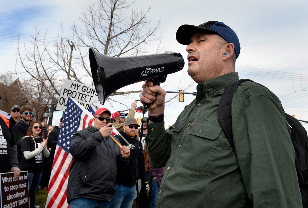 Scott Sommerdorf | The Salt Lake Tribune
A man who identified himself as "Nutin Fancy" spoke over a bullhorn to pro gun March Before Our Lives marchers as they rallied across the street from West High School, Saturday, March 24, 2018.
