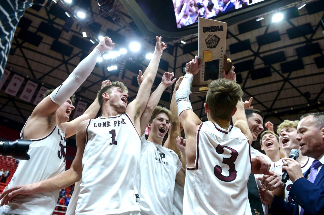 (Leah Hogsten  |  The Salt Lake Tribune) Lone Peak celebrates the win. Lone Peak defeated Pleasant Grove 61-44 to win the 6A High School BoysÕ Basketball Tournament Championship at the Jon M. Huntsman Center in Salt Lake City, Saturday, March 3, 2018. 